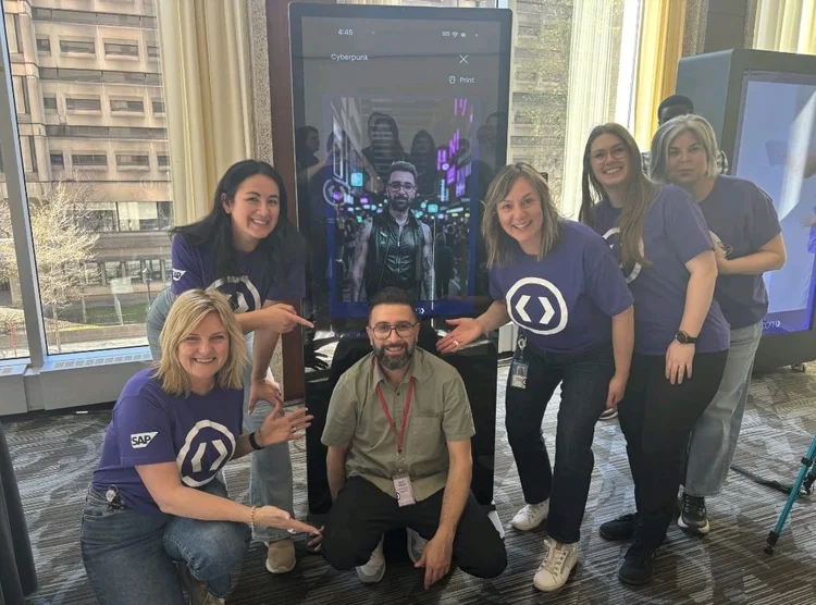 SAP Labs Canada event — attendees at the AI photobooth kiosk